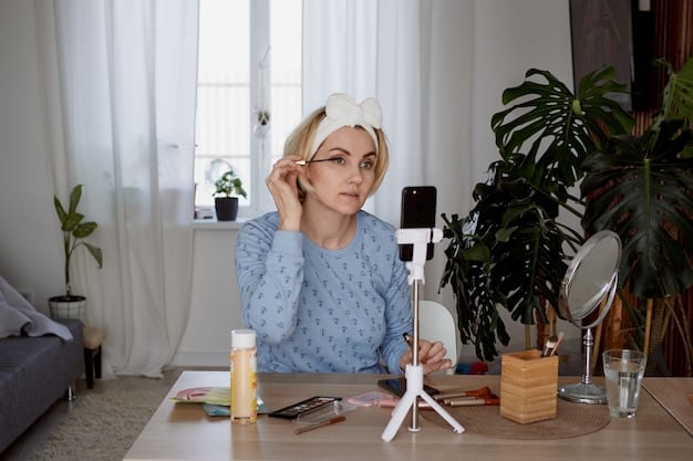An ASMR artist holding a binaural microphone, surrounded by various objects used for creating ASMR sounds, such as brushes, paper, and glass. The room is well-lit and organized, showcasing the tools of the trade.