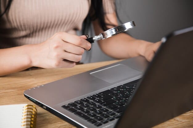 A person carefully reviewing TikTok's community guidelines on a laptop screen, with a magnifying glass focused on the rules about prohibited content.