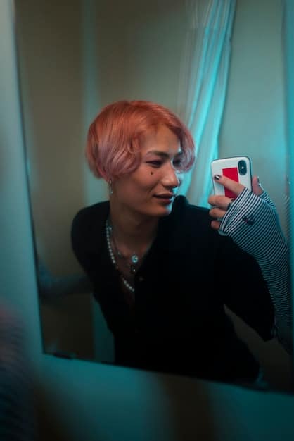 An influencer looking distressed as she reads hateful comments on her phone screen. The background is dark, and she appears to be in a private, secluded space, highlighting her isolation.