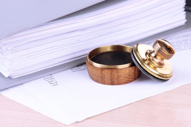 A gavel resting on top of a stack of tax documents, symbolizing legal issues and financial audits. The background is blurred, suggesting a courtroom or lawyer's office, highlighting the severe legal and financial implications of tax evasion.