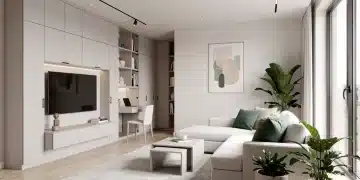 Salón moderno y luminoso con soluciones de almacenamiento integradas, ideal para reformas en casa en 2026.